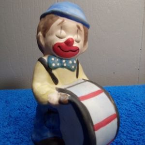 RATE clown figurine